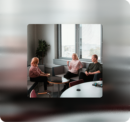 three people in casual meeting